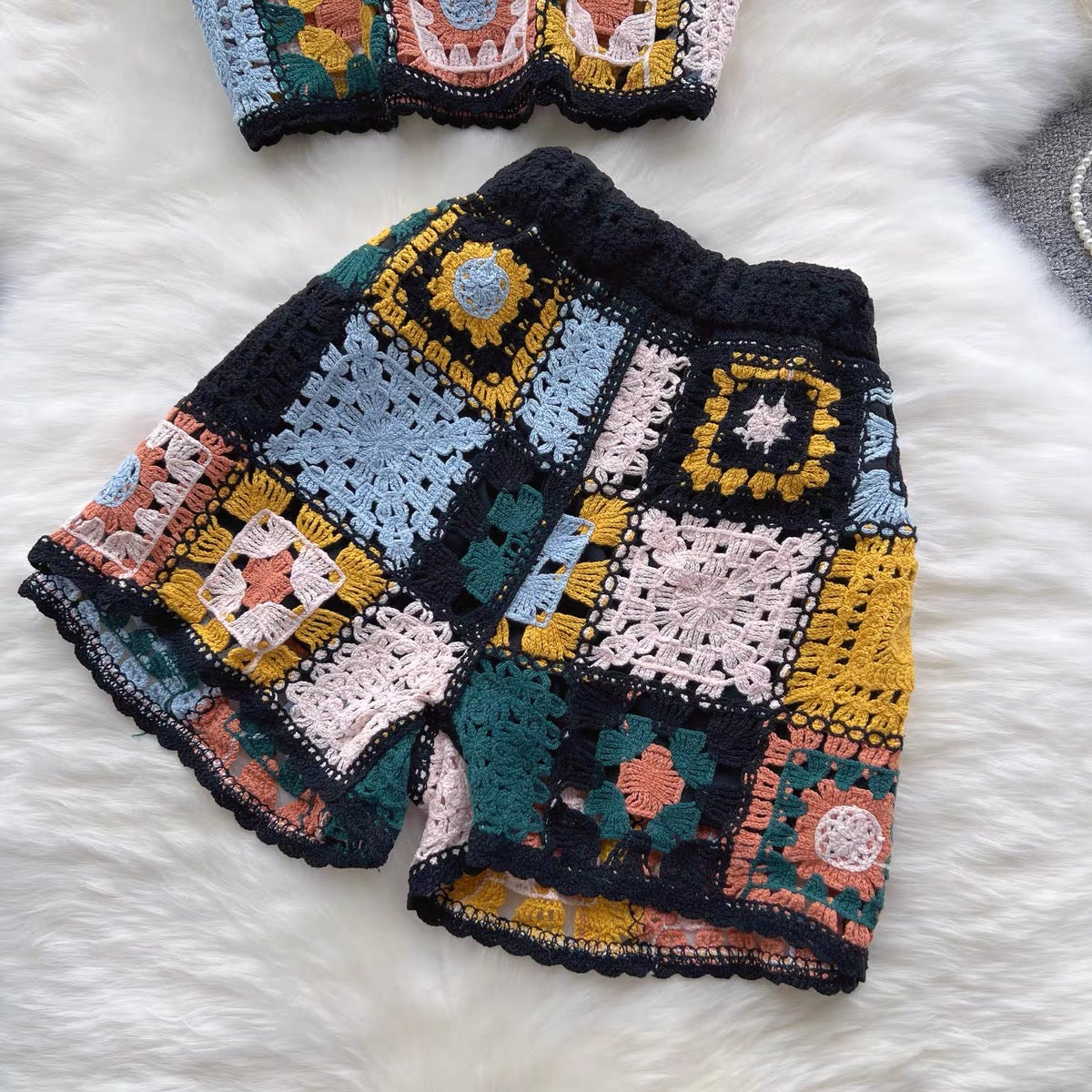 Ethnic style hand-crocheted short section small sling knitted vest female hollow blouse outer wear shorts two-piece suit tide