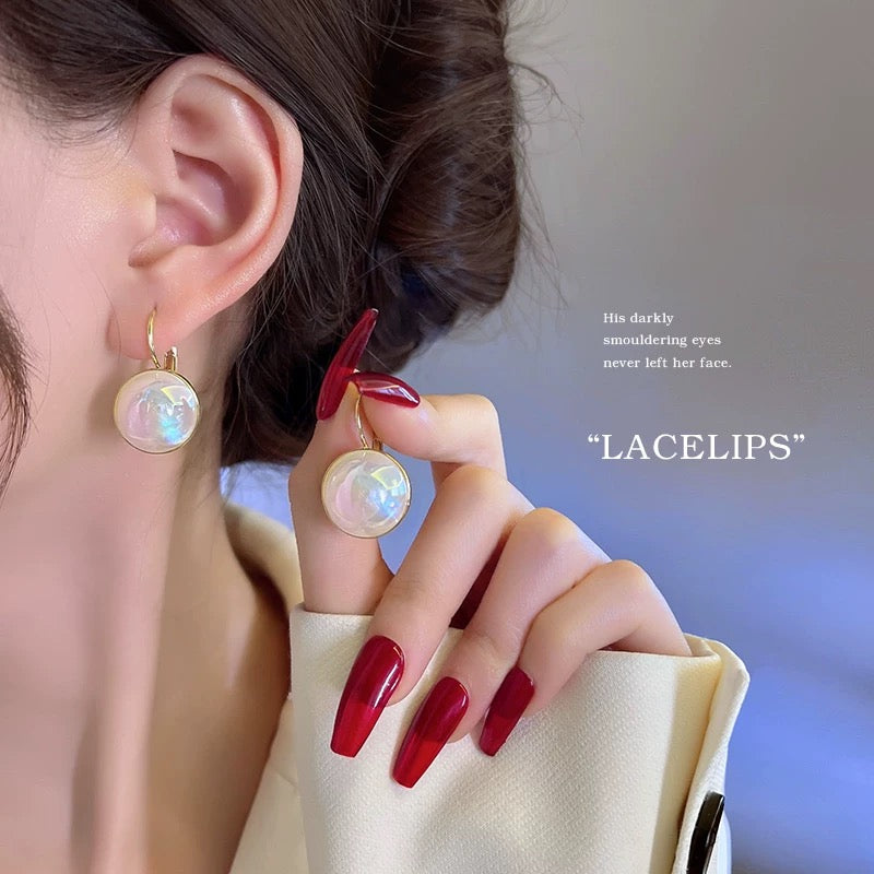 Mermaid Ji pearl ear buckle female niche design sense high-end light luxury cold wind earrings earrings 2022 new trend