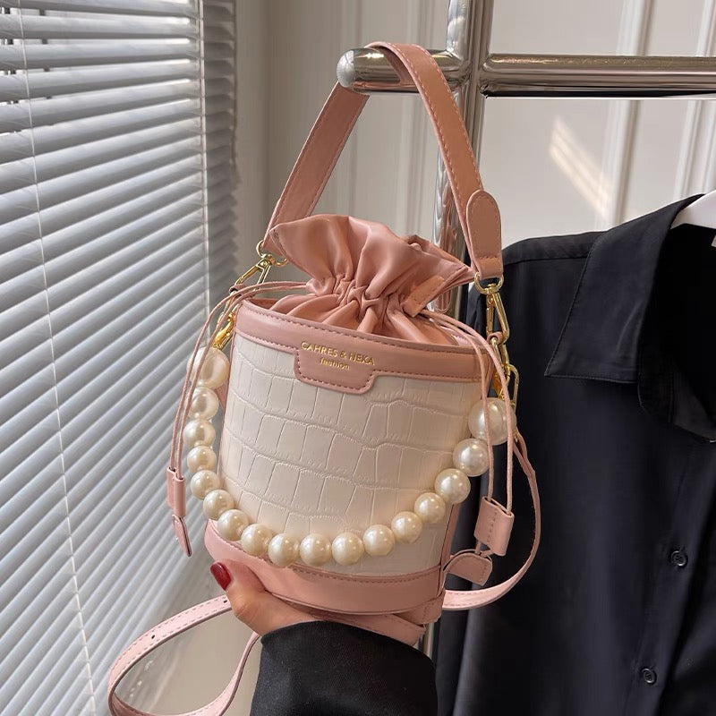High-quality pearl handbag women's 2022 new fashion all-match bucket bag ins niche explosion style messenger bag