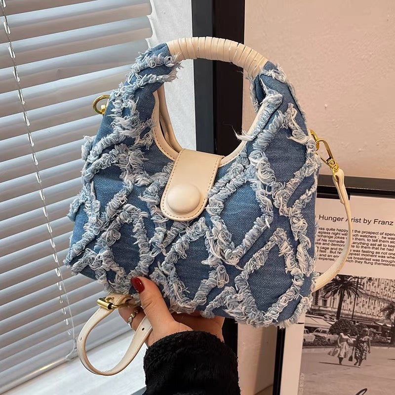 Niche design bag female 2022 new summer trend line denim messenger bag casual portable bucket bag