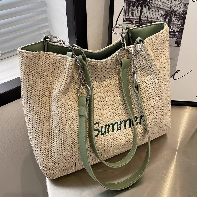 Summer straw woven large-capacity bag women's 2022 new niche wild woven bag Western style commuter shoulder tote bag