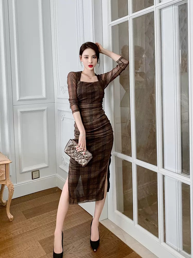 European station temperament high-end autumn dress new 2022 temperament goddess Fan cover the belly and show thin plaid dress 1558