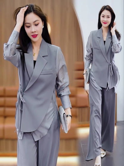 Summer new sun protection temperament fashion suit suit female design sense casual loose top trousers two-piece tide