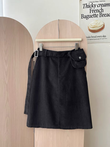 Japanese/Korean "Miu-style" retro polka-dot corduroy skirt (short-to-mid length) for women; versatile straight-cut A-line style featuring a waist bag—perfect for autumn and winter.
