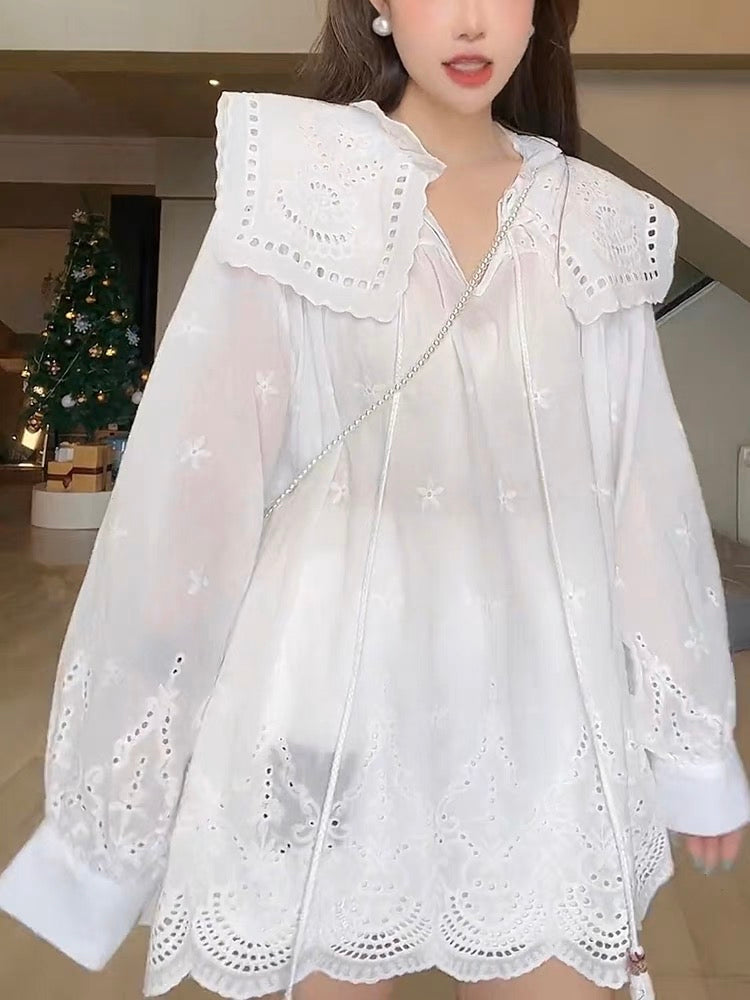 Design sense niche hollow jacquard doll collar shirt women's summer Korean casual fashion loose slim tassel top