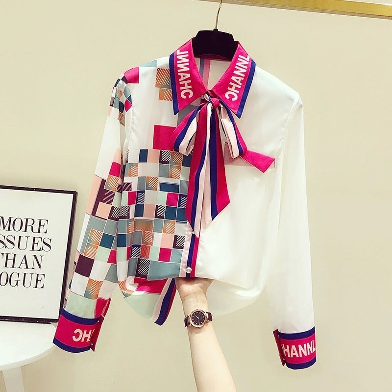 High-end mulberry silk shirt women's streamer plaid age-reducing design sense long-sleeved top spring and autumn 2023 new style