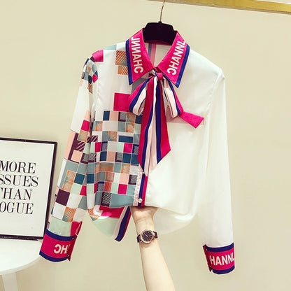 High-end mulberry silk shirt women's streamer plaid age-reducing design sense long-sleeved top spring and autumn 2023 new style