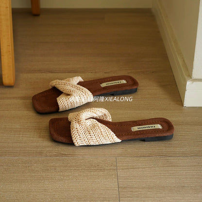 French-style woven crisscross flat slides for women – 2026 new summer square-toe sandals, perfect for vacation and the beach.