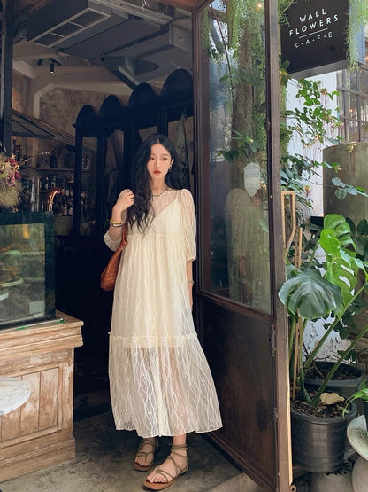 Ren Xiaoyi's vacation wind fairy long skirt net gauze French temperament unique design beige dress female high-end sense