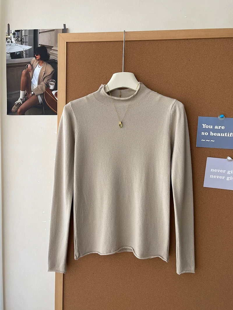 Retro soft and sticky cashmere rolled-edge turtleneck knit sweater for women, autumn and winter, gentle and versatile layering base layer top.