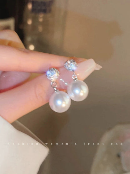 Romantic style ~ Micro-paved zircon pearl earrings for women, niche design, high-end 2023 new earrings.