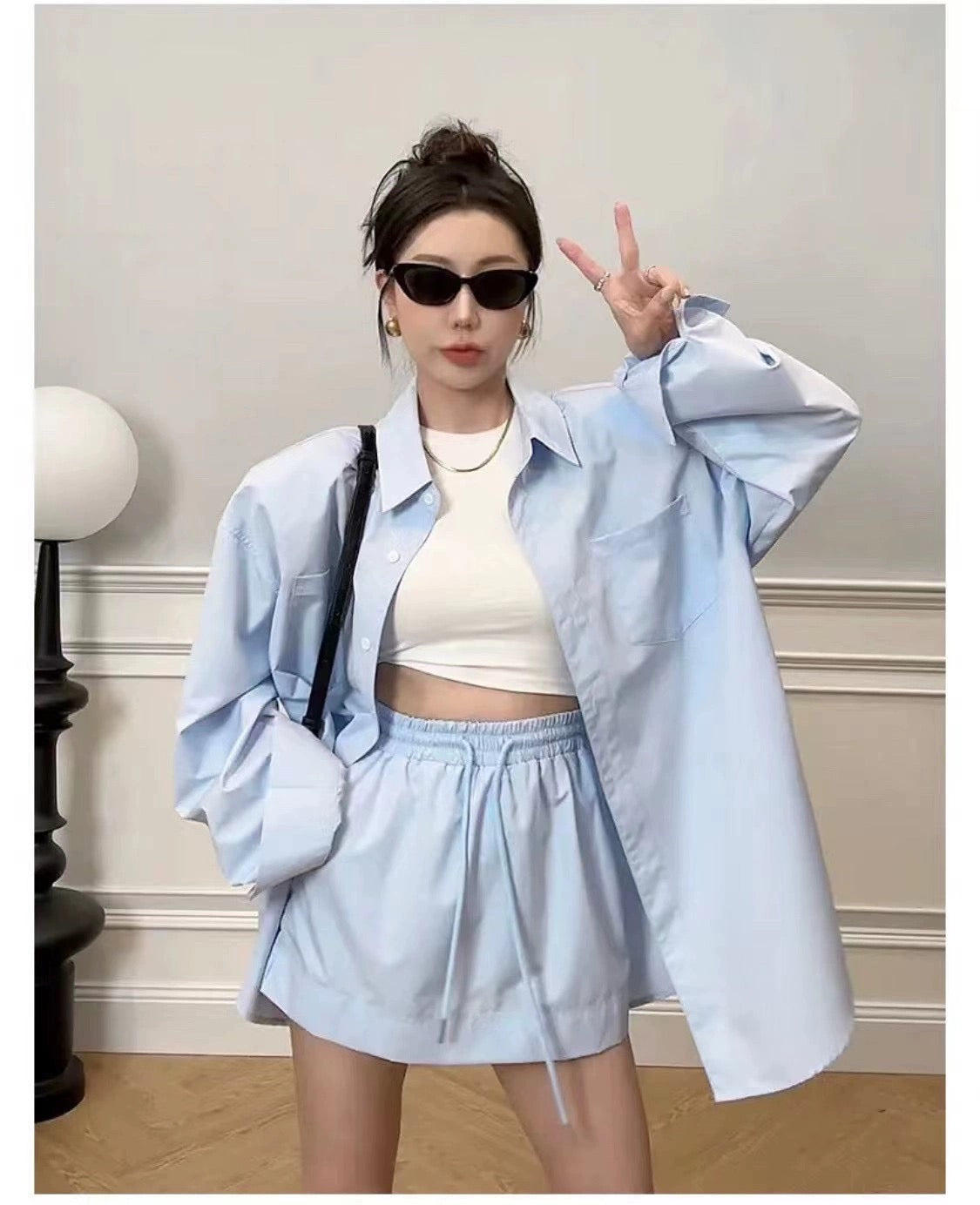2024 early spring and autumn new Korean lazy style loose long-sleeved solid color sunscreen shirt + short skirt two-piece suit summer