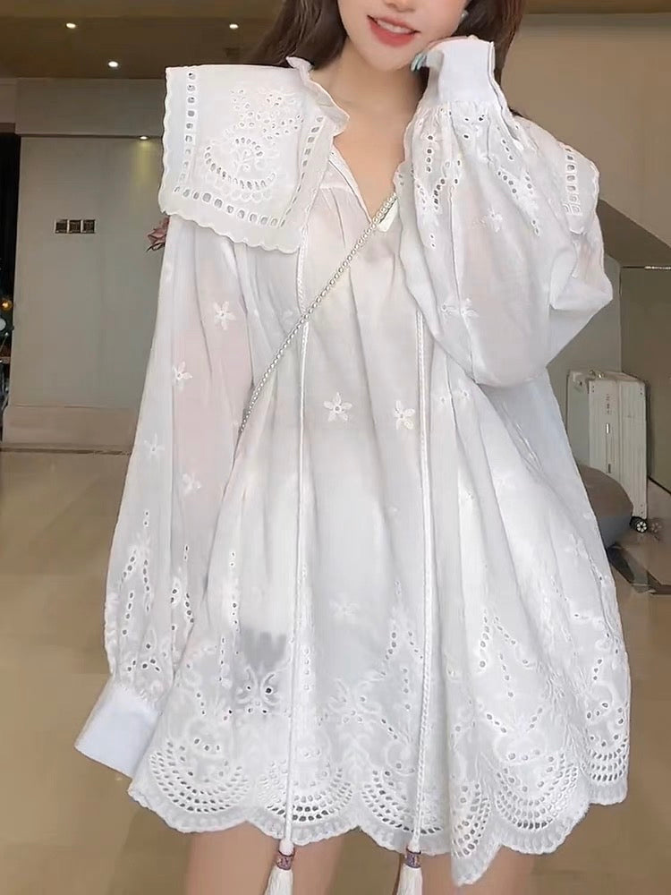 Design sense niche hollow jacquard doll collar shirt women's summer Korean casual fashion loose slim tassel top
