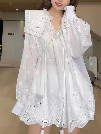 Design sense niche hollow jacquard doll collar shirt women's summer Korean casual fashion loose slim tassel top