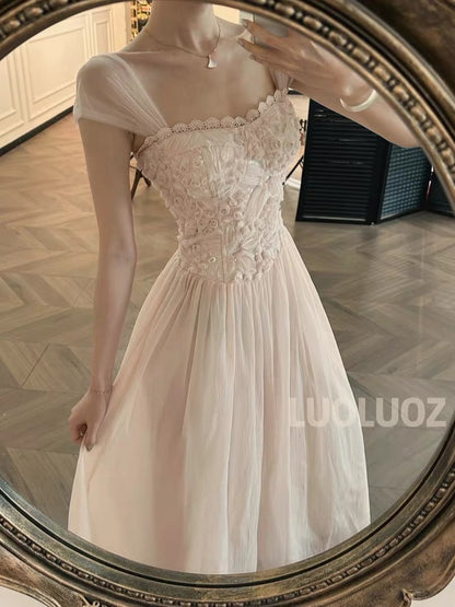 LUOLUOZ "Cherry Blossom Whisper" – A gentle-style, long dress featuring intricate embroidery, a soft square neckline, and a waist-cinching silhouette (JF138).