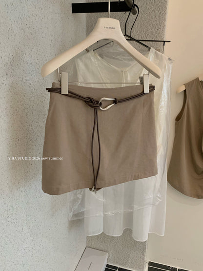 Elegant sleeveless draped-neck top with a high-waisted A-line skirt. Includes a belt and built-in safety shorts for a chic, polished look.