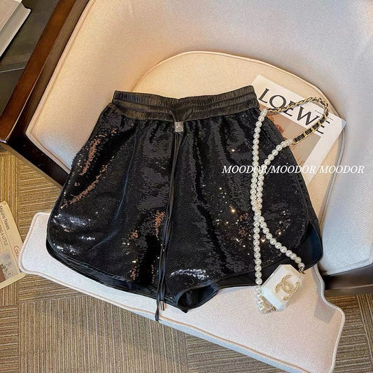 Black sequined shorts women's summer shiny elastic waist drawstring A-line fried street hot pants European high-end pants