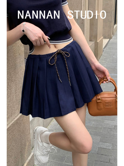 Join Zhang Yuanying/Show-style slim pleated short skirt with exposed navel short striped contrast color POLO shirt two-piece suit for women