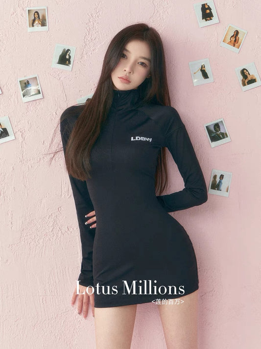 Lian’s Millions pinch-waist tight black slim-fitting dress with small stand-up collar