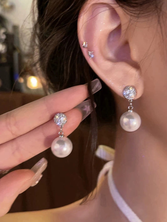 Romantic style ~ Micro-paved zircon pearl earrings for women, niche design, high-end 2023 new earrings.