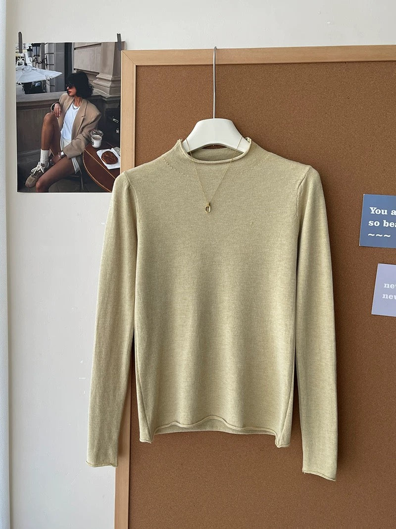 Retro soft and sticky cashmere rolled-edge turtleneck knit sweater for women, autumn and winter, gentle and versatile layering base layer top.