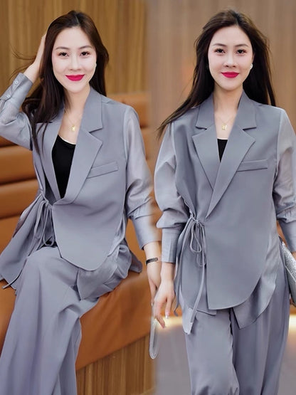 Summer new sun protection temperament fashion suit suit female design sense casual loose top trousers two-piece tide