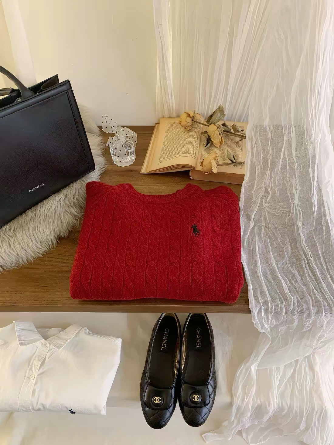 Women's thick, cable-knit pullover sweater featuring embroidery; suitable for layering or wearing as an outer top, with a trendy Korean-style aesthetic.