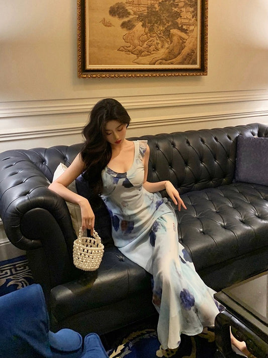 Ge Fuwen small flying sleeve suspender floral dress female 2024 summer new holiday style strap waist long dress