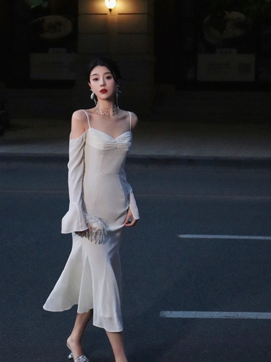 Thirteen and Little French suspender dress women's autumn long-sleeved white temperament gentle wind package hip mermaid skirt