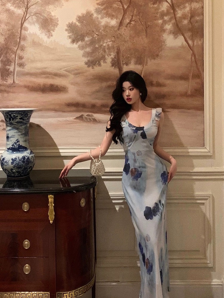 Ge Fuwen small flying sleeve suspender floral dress female 2024 summer new holiday style strap waist long dress