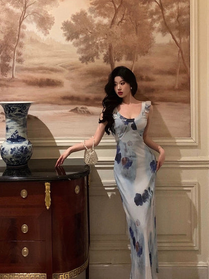 Ge Fuwen small flying sleeve suspender floral dress female 2024 summer new holiday style strap waist long dress
