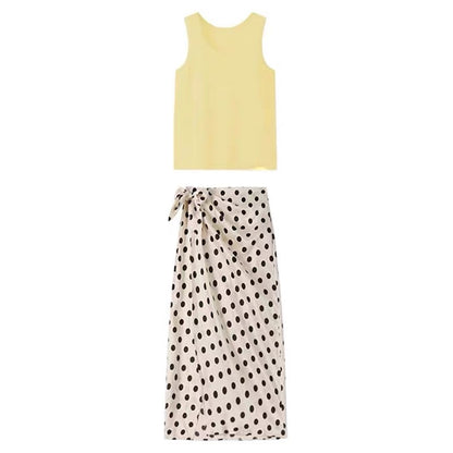 Summer French-style, niche, retro, Hong Kong-inspired A-line midi skirt set featuring a flattering polka-dot design.