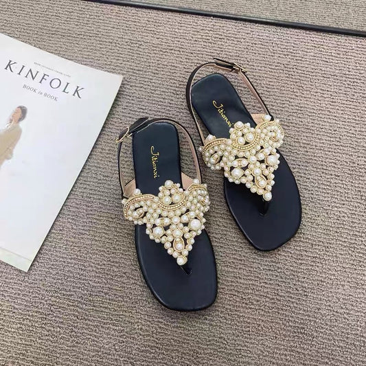 Temperament model ~ close your eyes and enter!  One word buckle strap clip toe pearl fairy sandals female clip feet rhinestone beach flat shoes