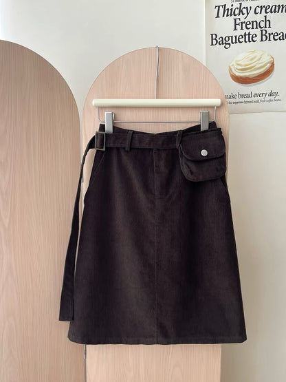 Japanese/Korean "Miu-style" retro polka-dot corduroy skirt (short-to-mid length) for women; versatile straight-cut A-line style featuring a waist bag—perfect for autumn and winter.