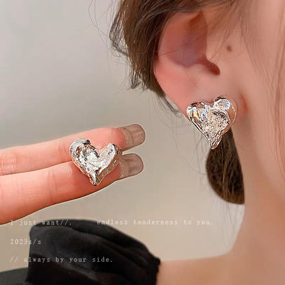 Real gold electroplated silver needle metal wind pleated heart earrings fashion personality design high-end sense earrings