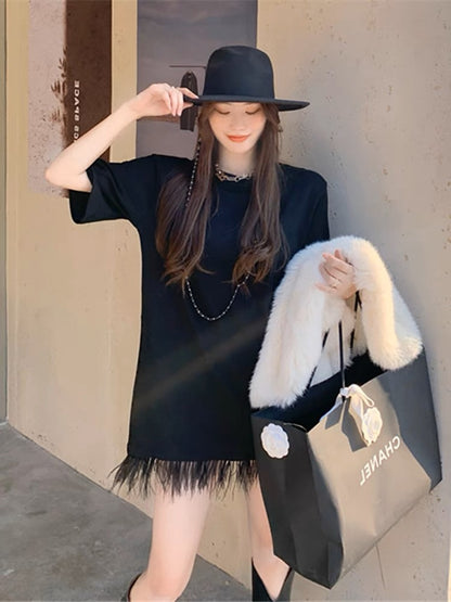 2023 new summer Korean style short-sleeved French retro Hepburn style raw edge tassel black T-shirt dress for women