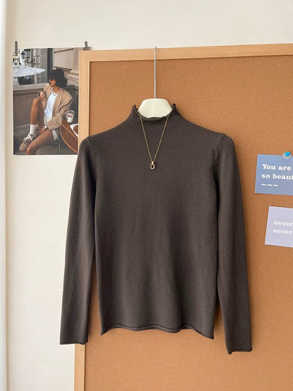 Retro soft and sticky cashmere rolled-edge turtleneck knit sweater for women, autumn and winter, gentle and versatile layering base layer top.