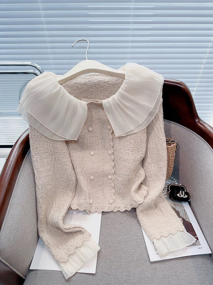 French chic and beautiful fairy splicing doll collar double-breasted short long-sleeved knitted outer top for women in autumn