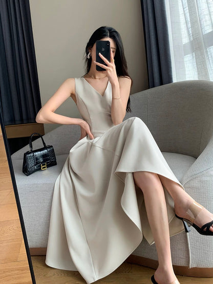 FT GUOGE sleeveless dress 2023 summer new style high-end temperament goddess style commuting slim V-neck long skirt