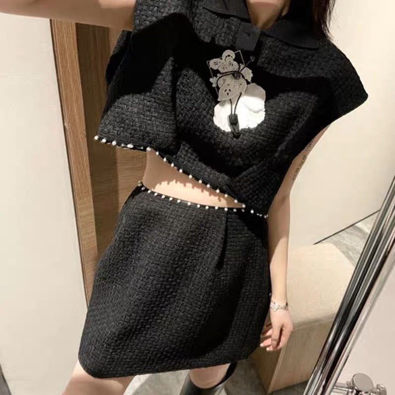 Xiaoxiang celebrity style black suit 2023 new pearl three-dimensional flower sleeveless short top A-swing skirt suit