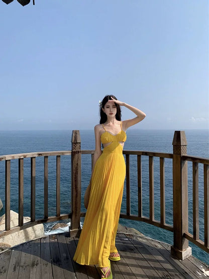 French dopamine holiday style yellow suspender dress female summer seaside sexy backless atmosphere long skirt