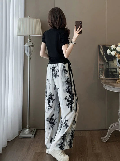 Short-sleeved sports casual suit for women, summer fashion, age-reducing internet celebrity, street style, chiffon wide-leg pants, two-piece set, western style