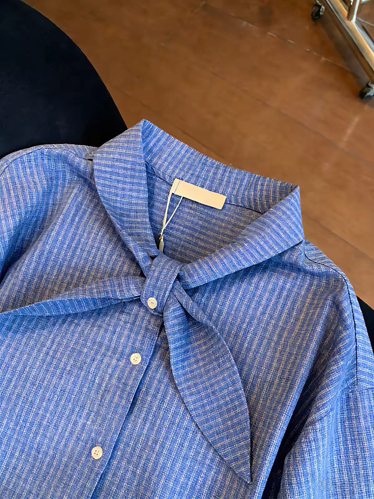Korean-style niche design blue plaid long-sleeve shirt with ribbon ties; a stylish, versatile, and youthful-looking piece perfect for spring and autumn.