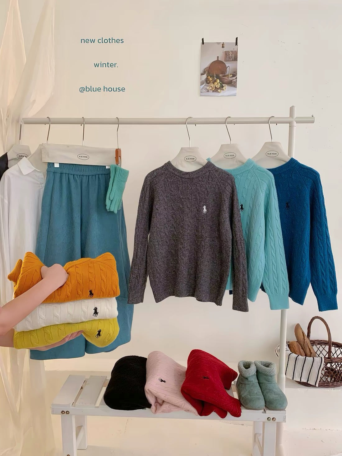 Women's thick, cable-knit pullover sweater featuring embroidery; suitable for layering or wearing as an outer top, with a trendy Korean-style aesthetic.