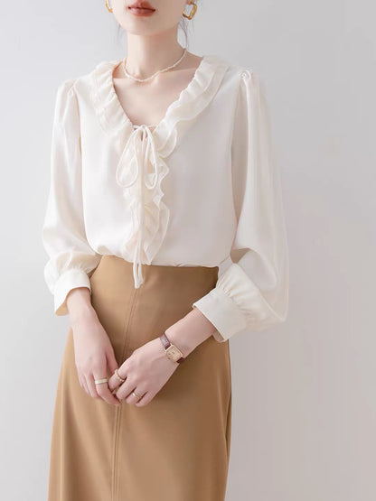 Women's French-style apricot V-neck blouse with lettuce-edge detailing – 2026 new autumn loose-fit shirt, suitable for professional workwear.