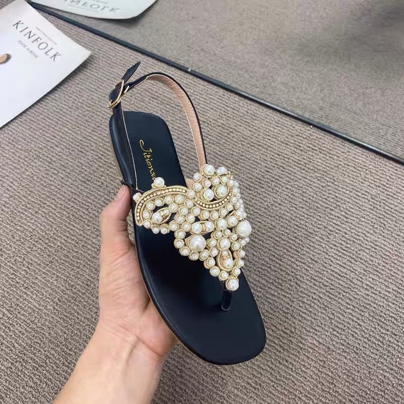 Temperament model ~ close your eyes and enter!  One word buckle strap clip toe pearl fairy sandals female clip feet rhinestone beach flat shoes