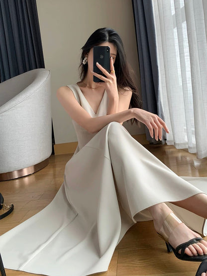 FT GUOGE sleeveless dress 2023 summer new style high-end temperament goddess style commuting slim V-neck long skirt