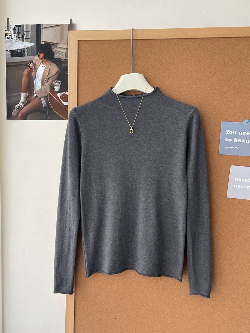 Retro soft and sticky cashmere rolled-edge turtleneck knit sweater for women, autumn and winter, gentle and versatile layering base layer top.