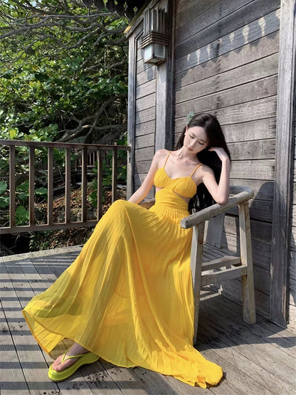 French dopamine holiday style yellow suspender dress female summer seaside sexy backless atmosphere long skirt