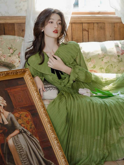High-end super fairy retro green dress women's autumn and winter 2023 new style small fresh waist style pleated long skirt